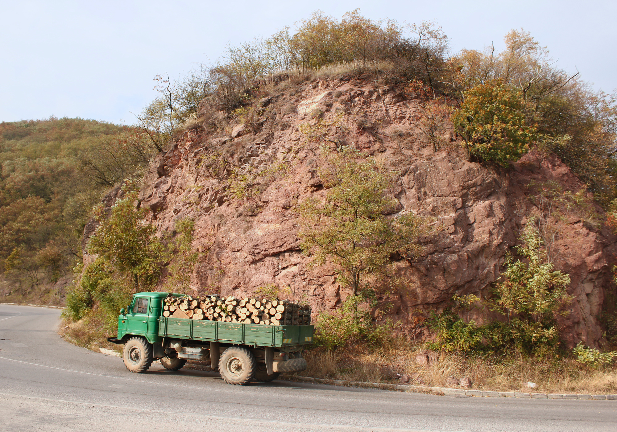 heavy loaded truck transporting timber somewhere in eastern europe